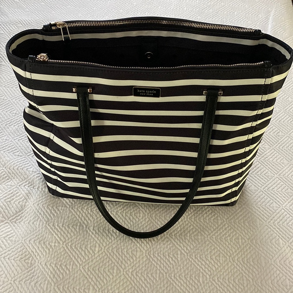 Kate Spade dawn sailing stripe tote, see photo for size. Nonsmoking environment.